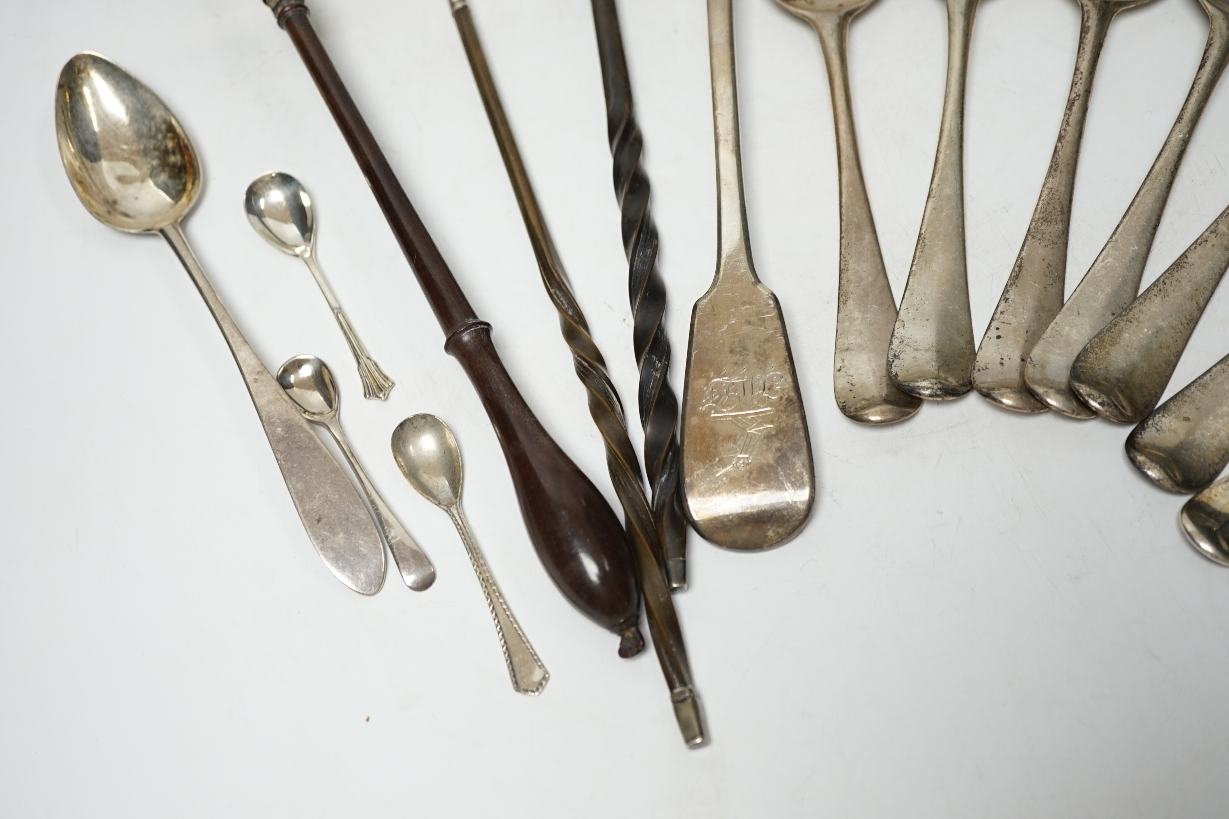 A late William IV silver fiddle pattern basting spoon, London, 1836, seven assorted 19th century silver base mark spoons, a Georgian Scottish dessert spoon, two toddy ladles, A George II brandy ladle, London, 1735, a Geo
